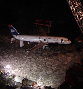 US Airways Flight 1549 is lifted out of the Hudson after its now famous ditching in 200
