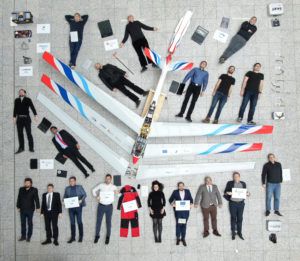 Participants in the final review of the FLEXOP project at the Technical University of Munich pose with the demonstrator