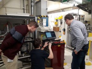 Researchers perform checks on equipment before a proton radiation test at the Paul Scherrer Institute in Switzerland