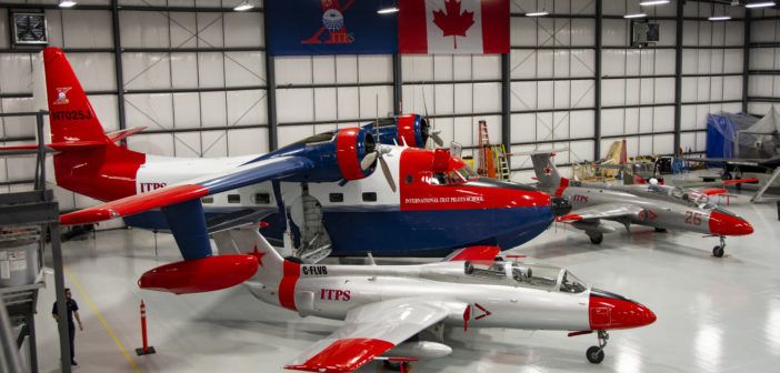 he HU-16 Albatross twin–radial engine amphibious seaplane in the hangar with the Aero L-29 Delfín military jet trainer