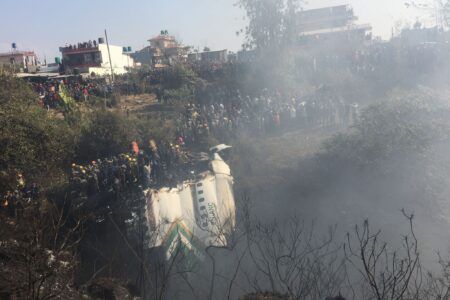 Rescue teams working near the wreckage of Yeti Airlines ATR72 aircraft in Pokhara. EPA/Krishna Mani Baral