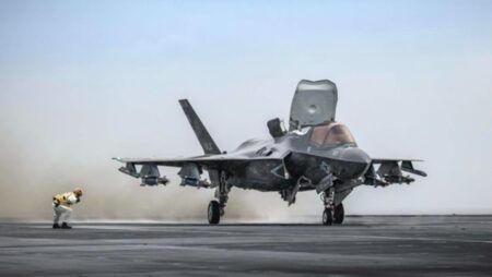 An F-35 Lightning II test pilot performed the first roll-on landing of an F-35B fighter jet aboard the HMS Prince of Wales aircraft carrier off the U.S. Eastern Seaboard