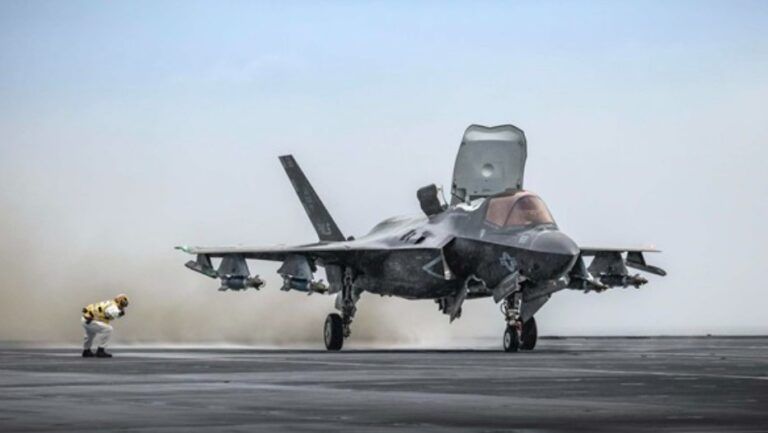 An F-35 Lightning II test pilot performed the first roll-on landing of an F-35B fighter jet aboard the HMS Prince of Wales aircraft carrier off the U.S. Eastern Seaboard