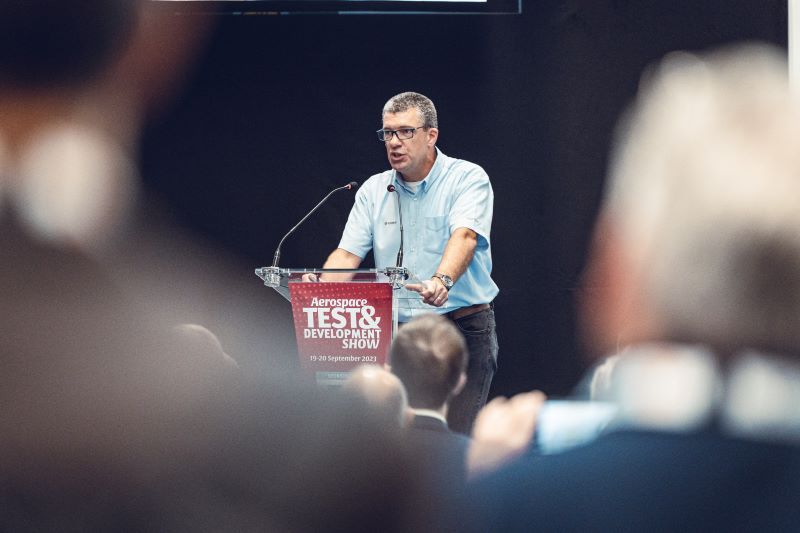 man at lectern