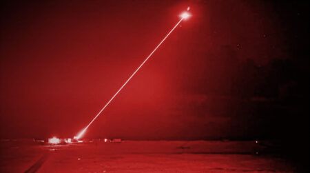 DragonFire laser weapon firing with with a red beam