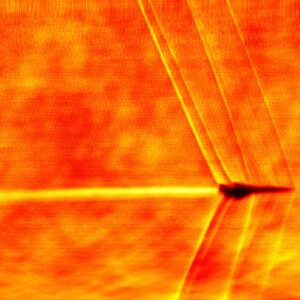 Schileren image of XB-1 achieving supersonic flight