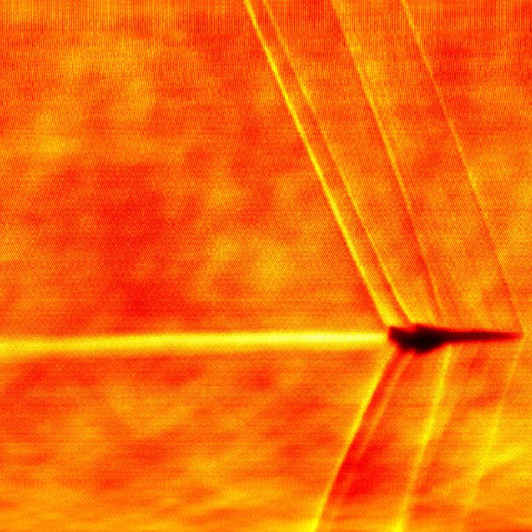 Schileren image of XB-1 achieving supersonic flight