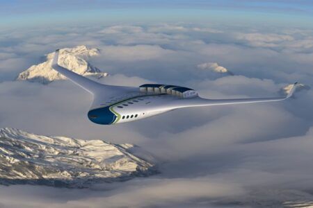 Conceptual rendering of sleek passenger aircraft with blue and white livery flying above snow-covered mountains