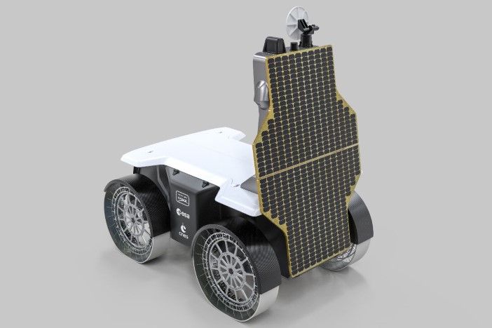 White and black lunar rover with solar panels and four wheels on gray background