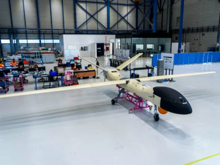 A drone sits in a hangar
