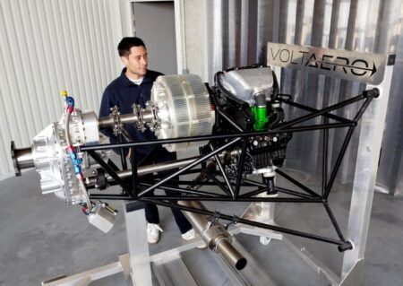 VoltAero HPU 210 hybrid aircraft powertrain mounted on test stand with Kawasaki engine and electric motor components visible