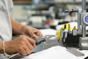 Test and measurement equipment in calibration laboratory with precision instruments and certification documentation