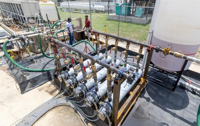 Large industrial heat exchanger testing facility with multiple fluid flow loops and measurement equipment