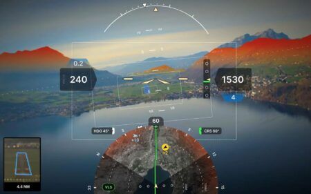 Advanced cockpit display showing AI-assisted flight systems interface with various data overlays on mountain landscape background