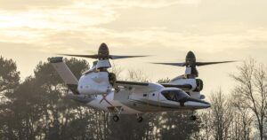 Leonardo NGCTR-TD tiltrotor technology demonstrator in hover flight with proprotors in vertical position and landing gear extended