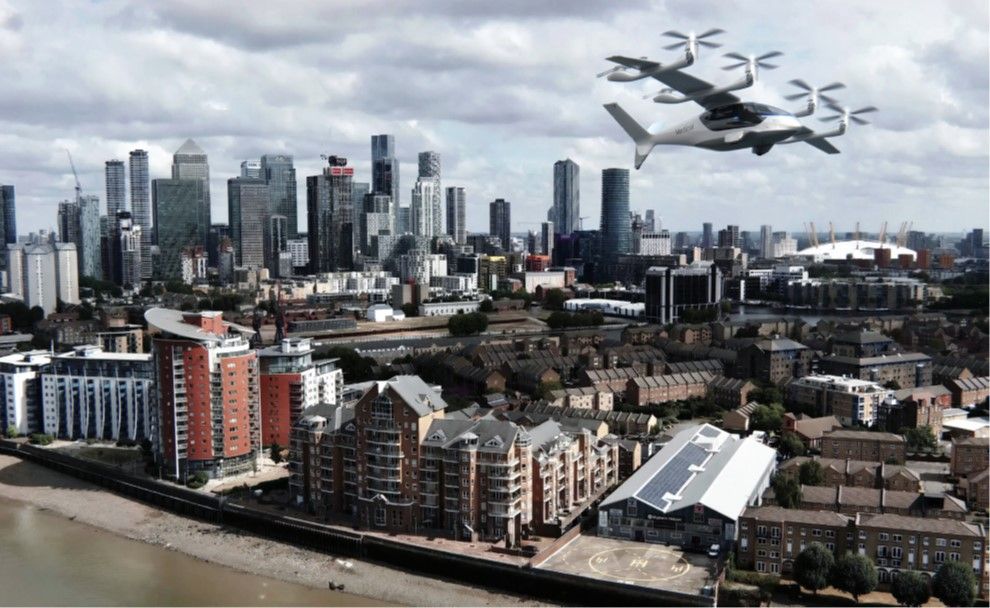 Rendering of Vertical Aerospace Valo eVTOL aircraft flying over London with Canary Wharf skyline in background