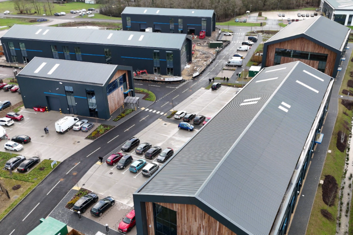 Aerial view of the Westcott Space Hub campus showing multiple modern industrial buildings with parking facilities