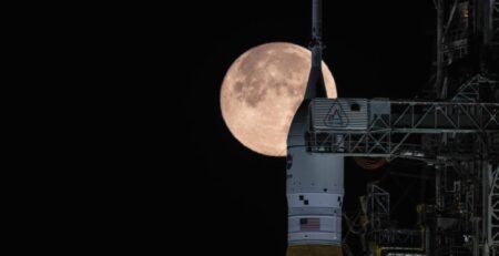 NASA's crawler-transporter 2 carrying the Artemis II SLS rocket and Orion spacecraft arriving at the Vehicle Assembly Building at Kennedy Space Center on February 25, 2026