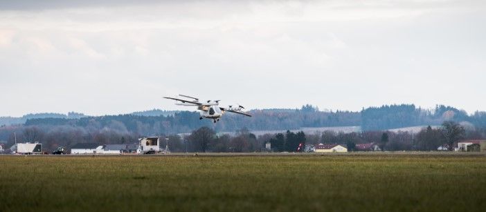 Romeo eVTOL in flight at the ERC Flight Test Center with rolling hills in the background