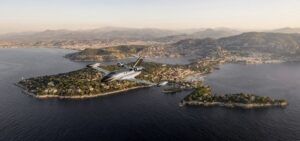 Rendered image of the Beyond Aero BYA-I One in flight over a coastal landscape