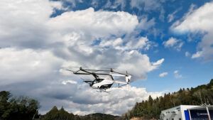 SkyDrive SD-05 three-seat eVTOL aircraft in flight during testing in Japan