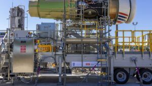 A modified Rolls-Royce Pearl 15 engine on a test stand at NASA's Stennis Space Center during a 100% hydrogen ground test