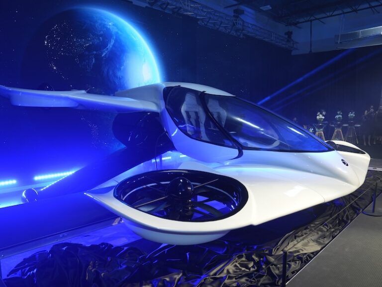 Doroni Aerospace H1-X showroom model on display at the Soul of the Sky unveiling event, showing the aircraft's in-wing ducted fan and tandem wing configuration
