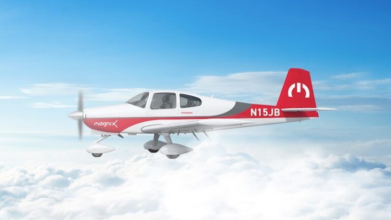 Van's Aircraft RV-10 kit plane in magniX red and white livery flying above clouds