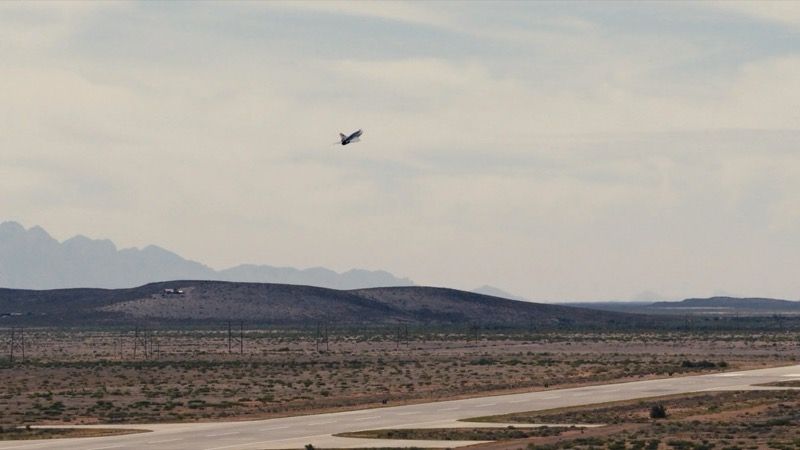 Quarterhorse Mk 2.1 uncrewed aircraft airborne over the New Mexico desert with mountains in the background