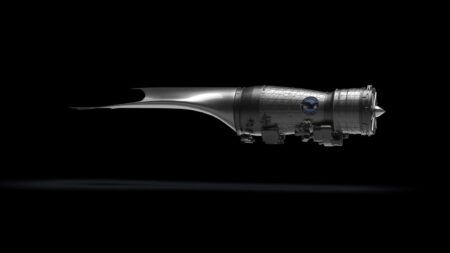 Pratt & Whitney rendering of the XA103 adaptive-cycle engine in side profile, showing a faceted core casing with company emblem, swept aft-fan duct and pointed aft cone, against a black background