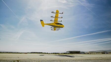 Wisk Aero Generation 6 eVTOL aircraft registered N607WA in hover above Hollister Airport runway during first flight
