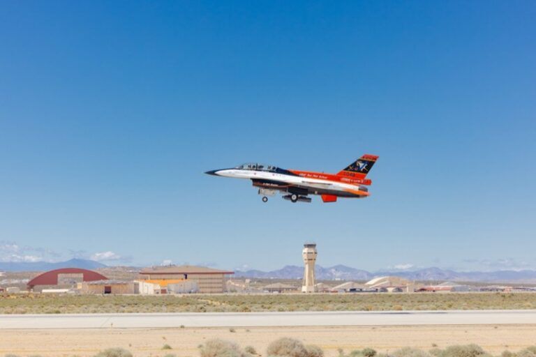 X-62 VISTA flies autonomous target intercept during Edwards tests The orange, white and blue X-62 VISTA, a modified F-16, takes off from Edwards Air Force Base with the control tower behind