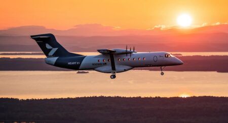 Heart Aerospace’s X1 demonstrator electric aircraft makes first flight Heart Aerospace X1 electric demonstrator aircraft in flight against an orange sunset sky over water