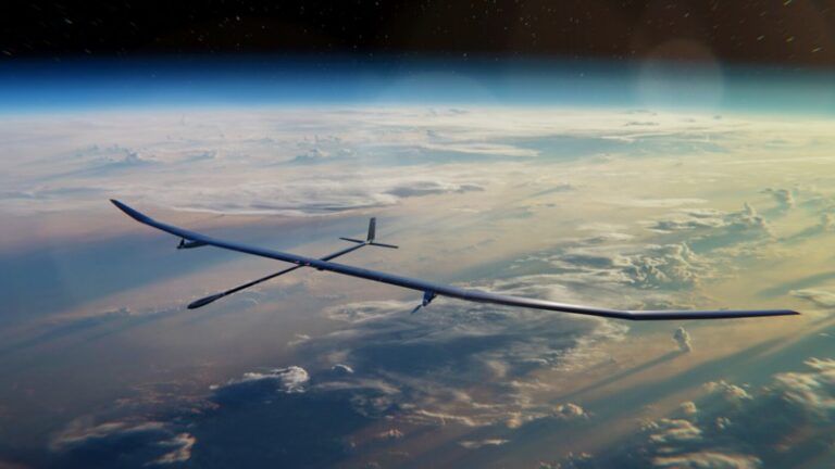 ARIA invests £70m in stratospheric aircraft projects A solar-powered PHASA-35 uncrewed aircraft with a long slender wing flying in the stratosphere high above the Earth, with the curve of the planet and cloud layers below