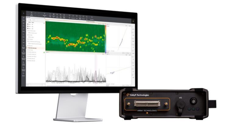 Eddyfi Technologies Ignite instrument beside a computer monitor displaying a green C-scan with red indications above signal trace and impedance plots